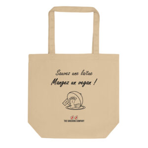 Tote bag « Sauvez une laitue, mangez un vegan ! » avec un couvercle soulevé révélant un pied portant une étiquette « vegan bio ».