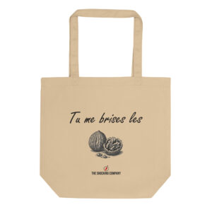 Tote bag humoristique avec la phrase « Tu me brises les » en écriture manuscrite et un dessin de deux noix, dont une brisée.