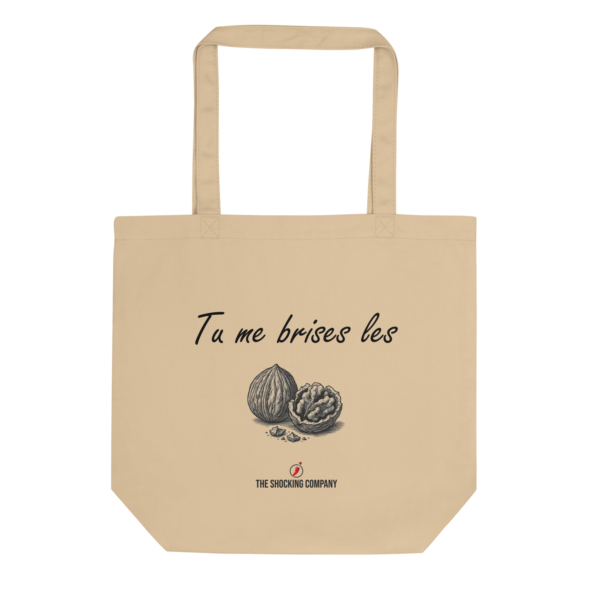 Tote bag humoristique avec la phrase « Tu me brises les » en écriture manuscrite et un dessin de deux noix, dont une brisée.