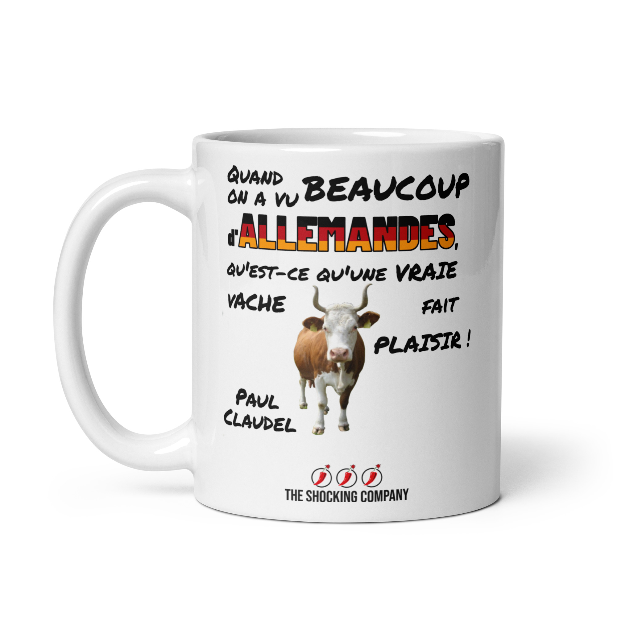 Tasse avec citation provocatrice attribuée à Paul Claudel, mot « allemandes » aux couleurs allemandes et illustration d’une vache blanche et marron.